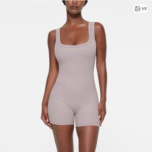 SKIMS Sleeveless Scoop-Neck Ribbed Romper in Taupe
